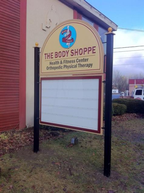 Body Shoppe Carved letter wood sign
